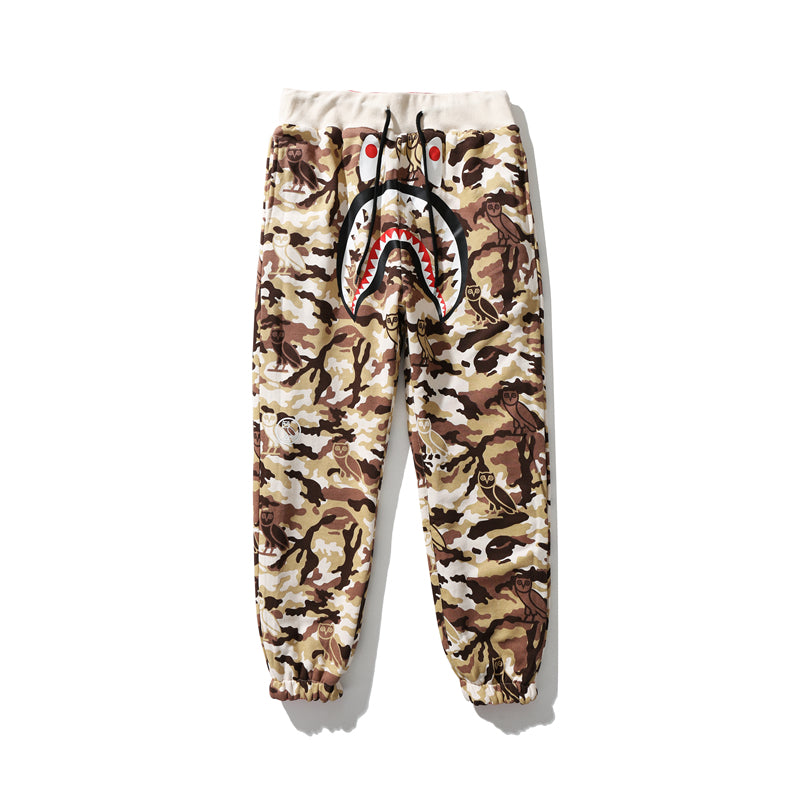 BAPE x OVO Woodland Camo Shark Reversible Sweatpants
Red